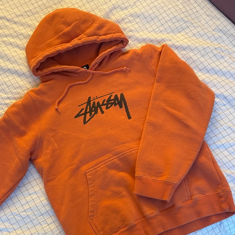 orange Stussy hoodie